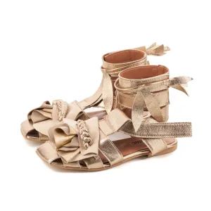 Light is my Accomplice golden leather sandals