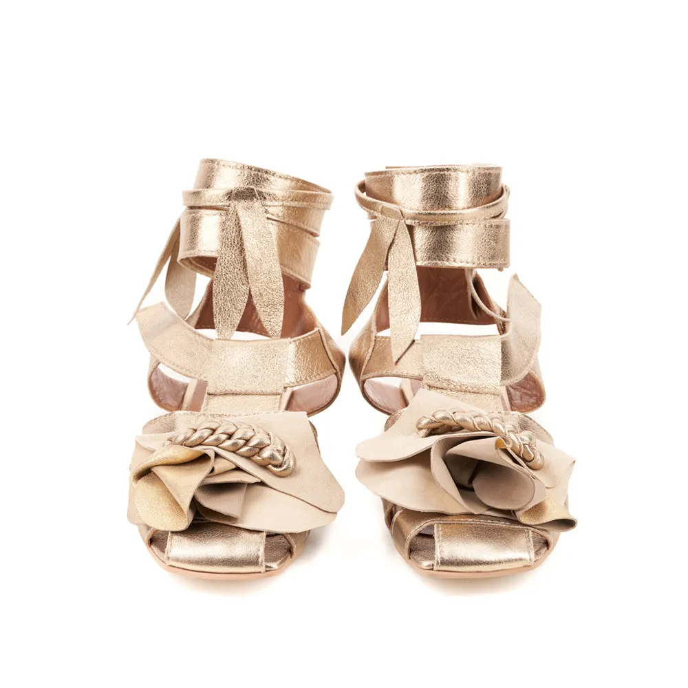 Light is my Accomplice golden leather sandals